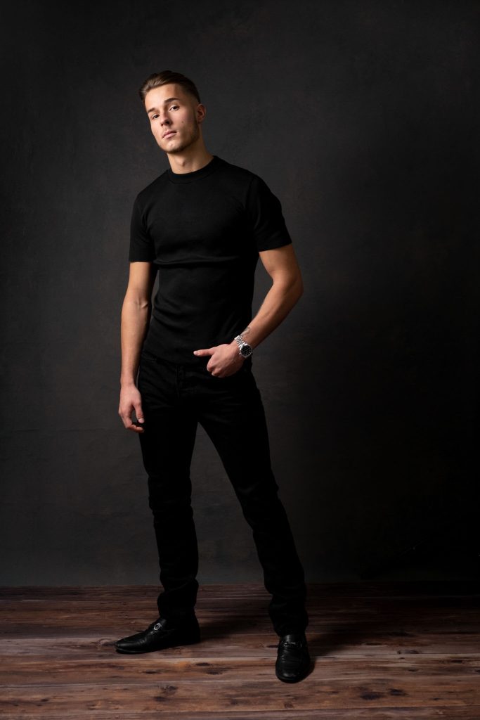 modelling portfolio full body image of a male model wearing all black outfit